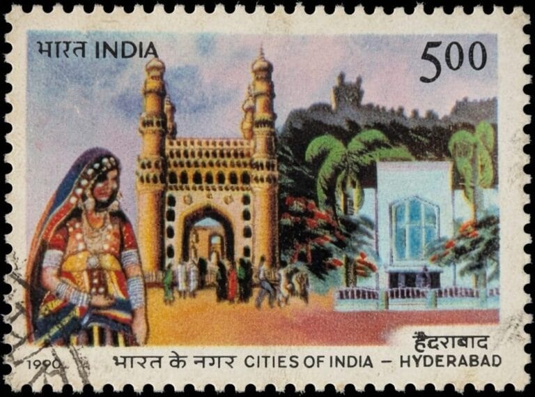 The 1990 Charminar stamp from India's Cities of India series, 500 paise, showing the Hyderabad monument below a woman in ornate ceremonial costume