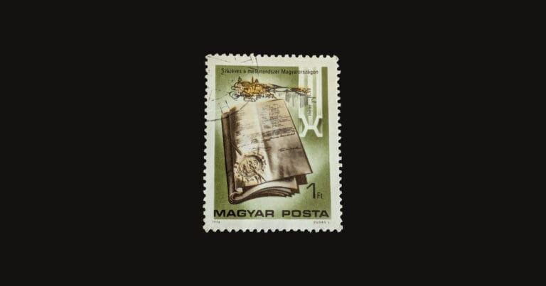 Hungary's 1976 metric system stamp, one forint, shown whole on a black field — a sealed 1874 document, a gold riverside skyline and the X-shaped prototype metre