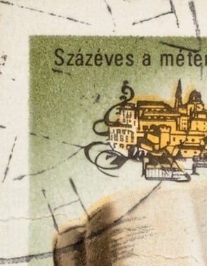 Macro of the partial machine cancellation crossing the top perforations of the Hungarian 1976 metric system stamp, one forint, with no legible town mark or date