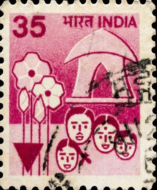 India 35 paise sixth definitive series family planning stamps issue showing four faces, a hut, flowering plants and a small inverted triangle in the lower left corner