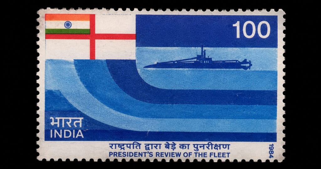 Indian one-rupee postage stamp from 1984 showing a submarine silhouette, Naval Ensign, and blue wave design, commemorating the President's Review of the Fleet