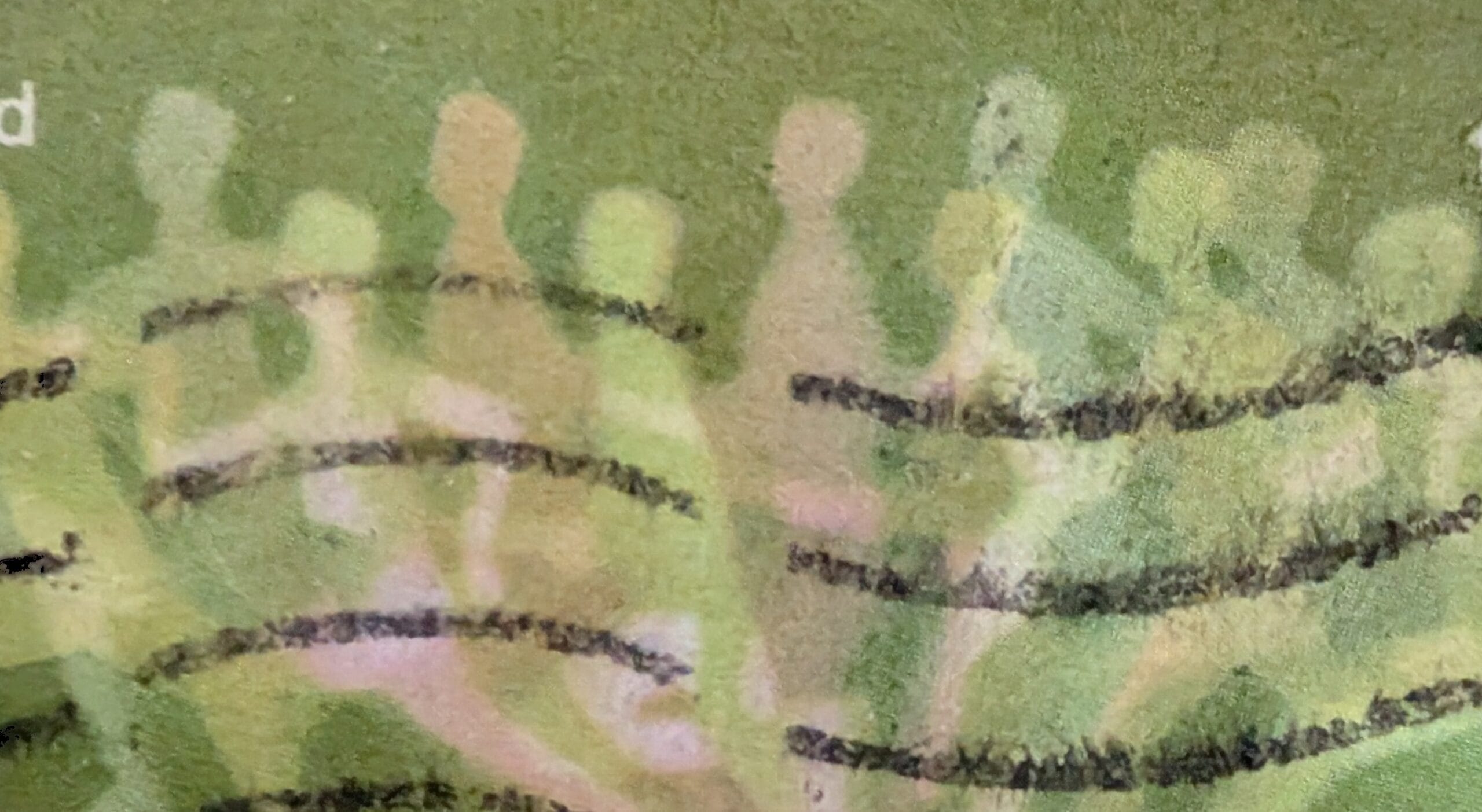 Macro of the blurred, multiple-exposure runners on the 1970 Commonwealth Games stamp, pale figures dissolving into the green as they cross the finishing tape
