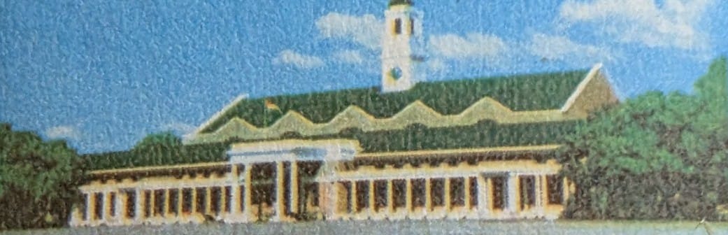 Macro of the long pillared facade of the Chetwode Building and its reflection in the ornamental water on the 1982 Indian Military Academy stamp
