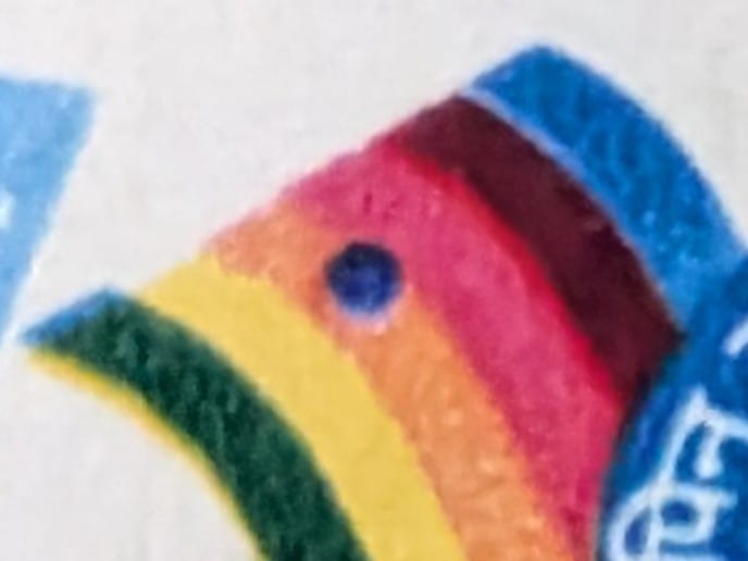 Macro of the messenger bird's head on the 1989 Use Pincode stamp, stacked colour ribbons compressing into a beak with a single dark eye