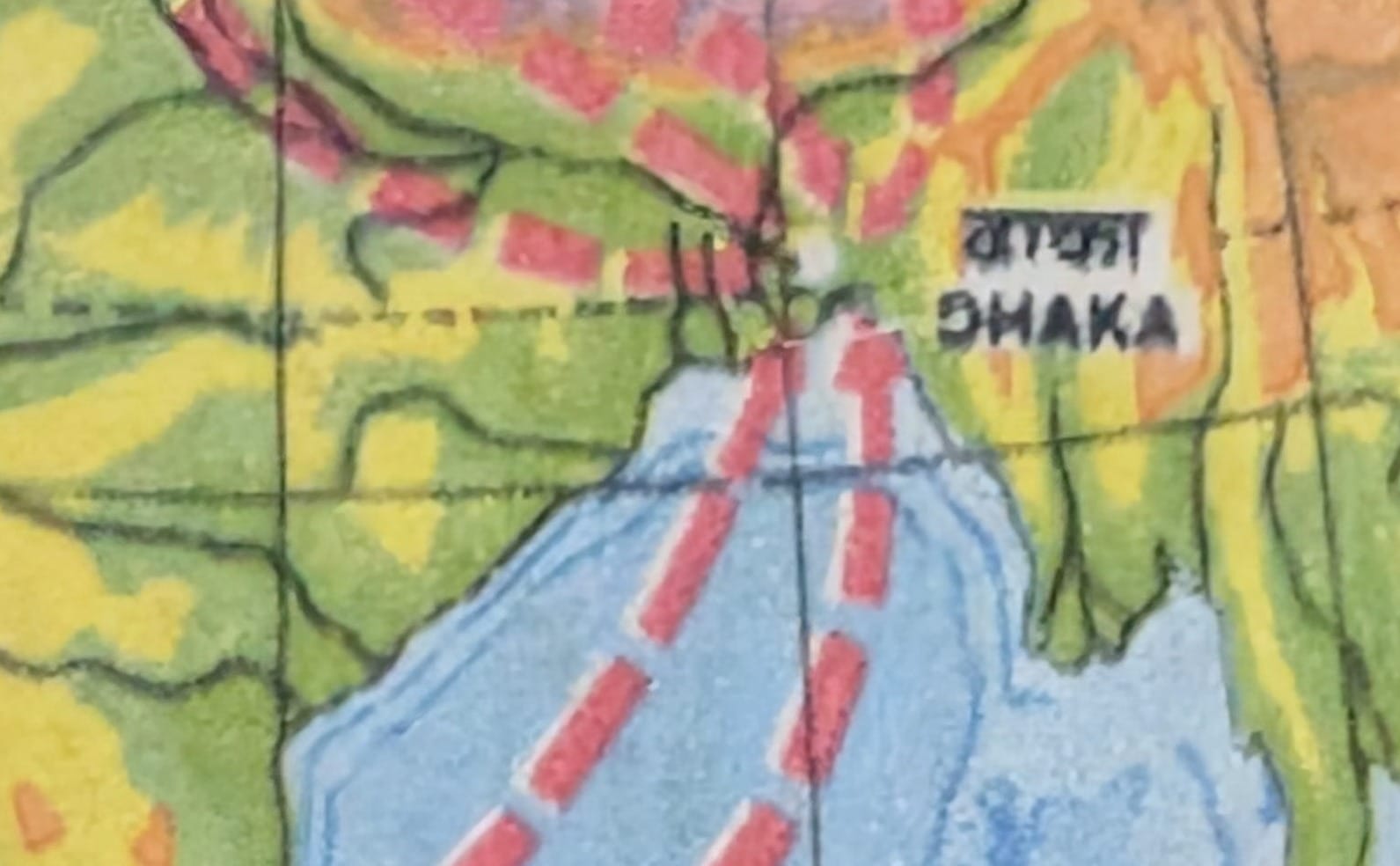 Macro of the 1985 India stamp showing every dashed red route bending inward to meet at Dhaka, labelled in Bengali and English