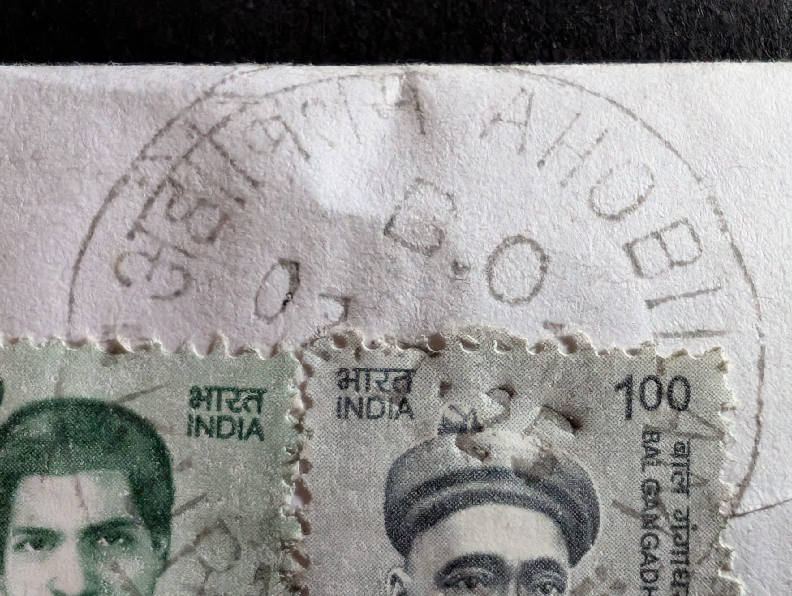 Srinivasa Ramanujan stamp and a Bal Gangadhar Tilak definitive tied together on an envelope corner by an Ahobilam branch office cancellation