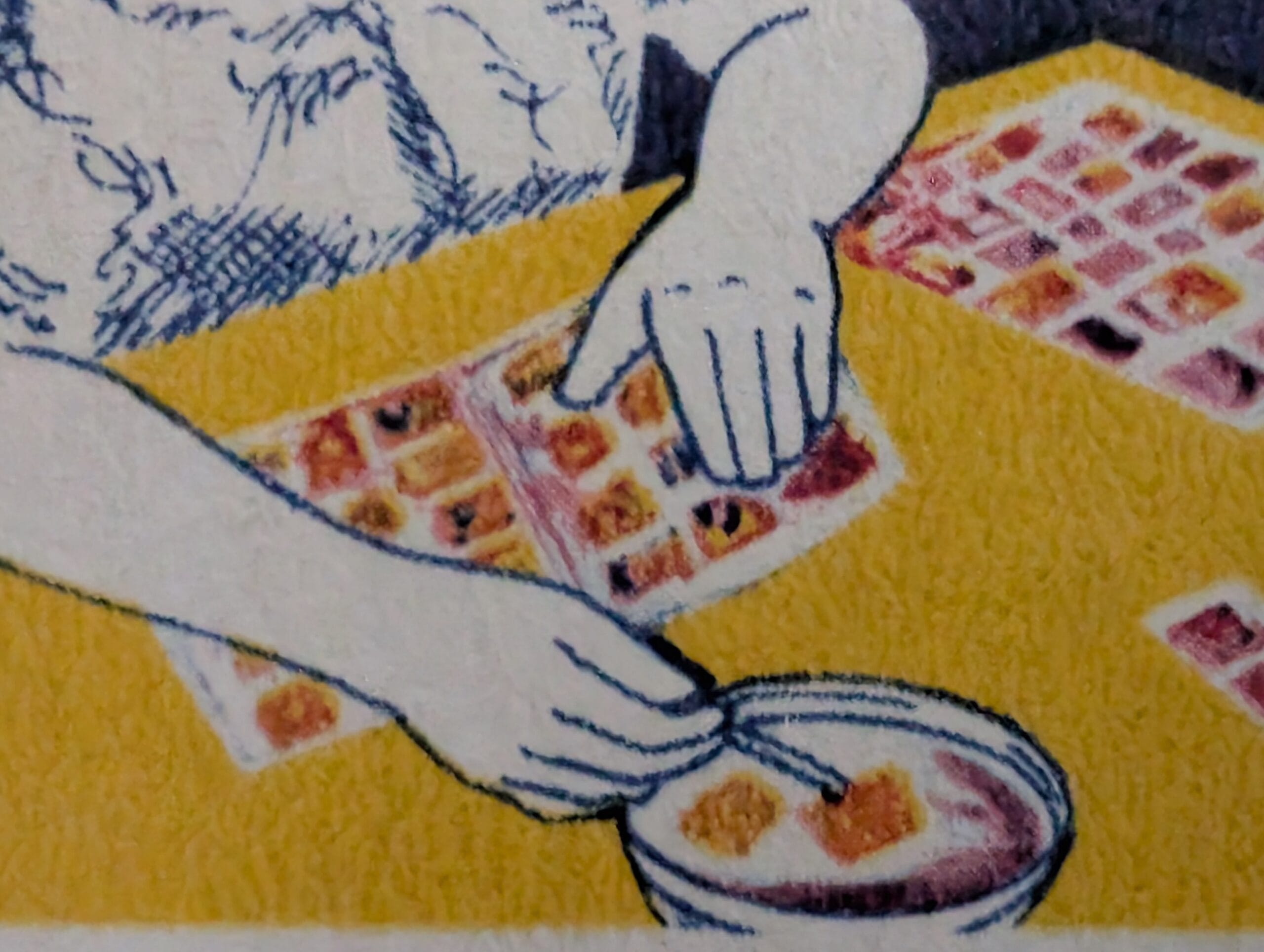 Macro detail of the Stamp Collecting 1989 stamp: a child's hands placing loose stamps into an album beside a bowl of water